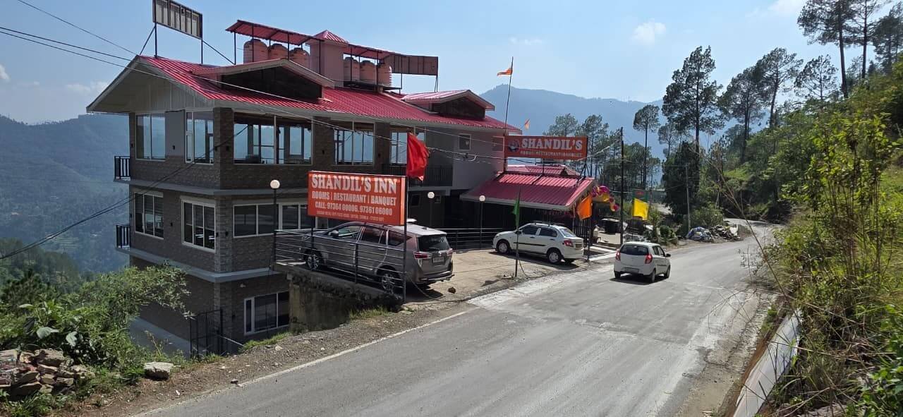 Shandil's Inn exterior on Shoghi bypass — rooms, restaurant and banquet in Shimla hills